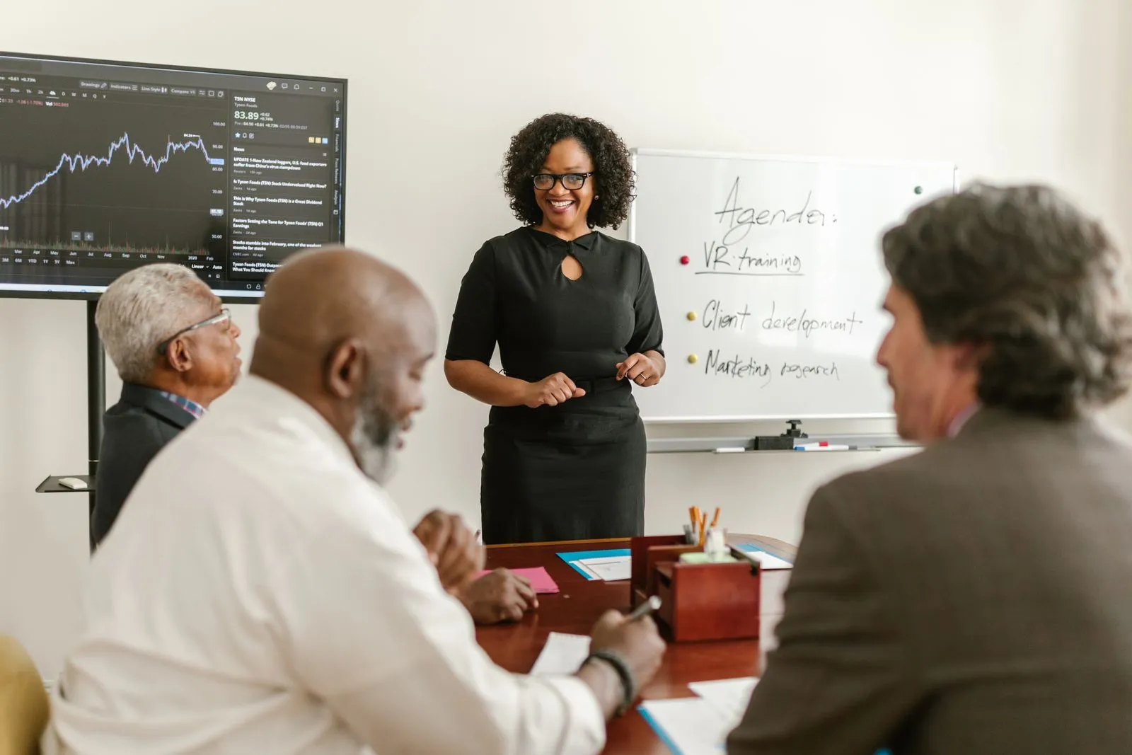 An instructor leading a training session for an engaged group of staff