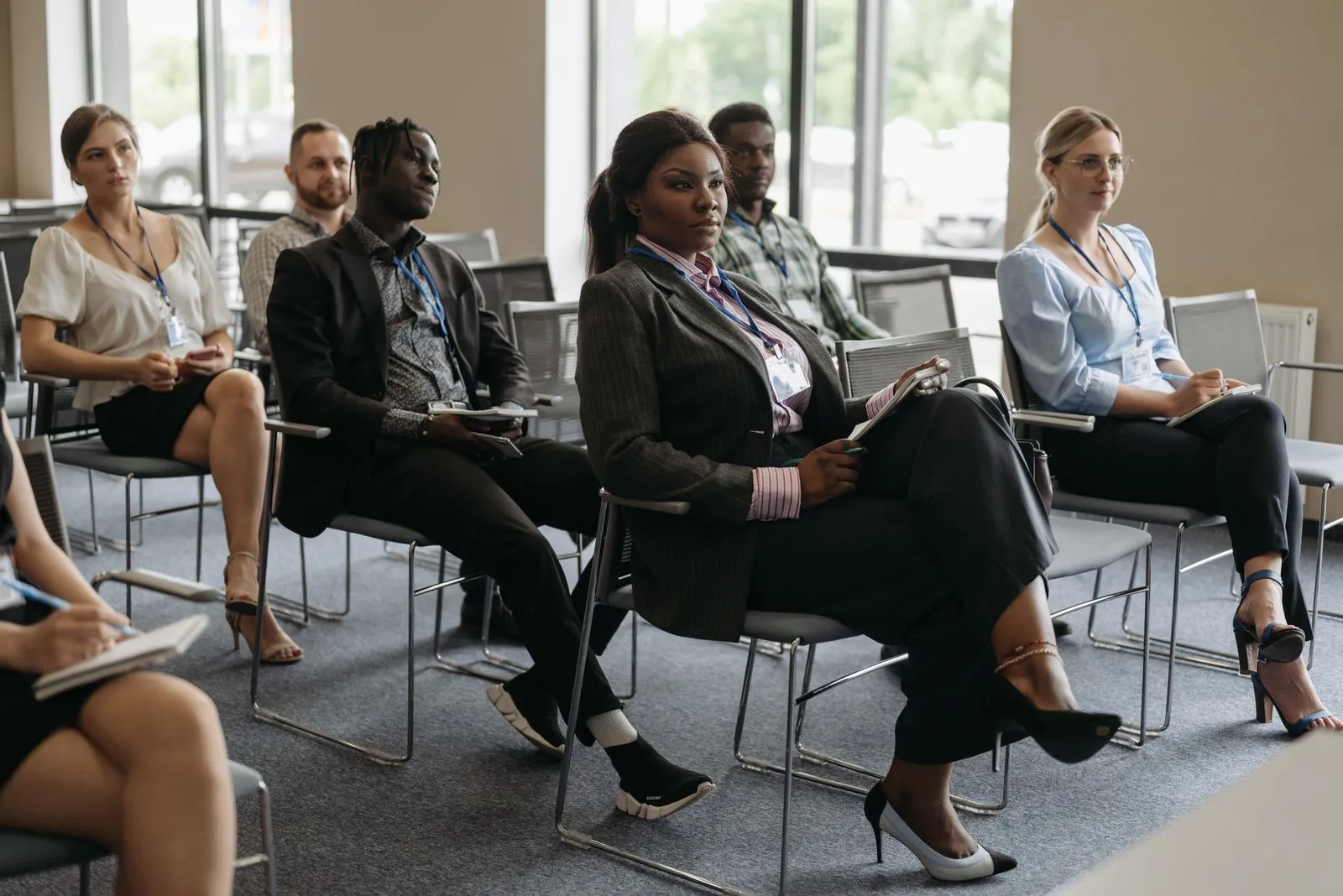 Assisted living directors and managers listening during a leadership session