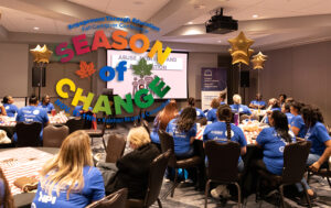 season of change caregiver conference image of caregivers listening to lecture - Engagement Through Education |